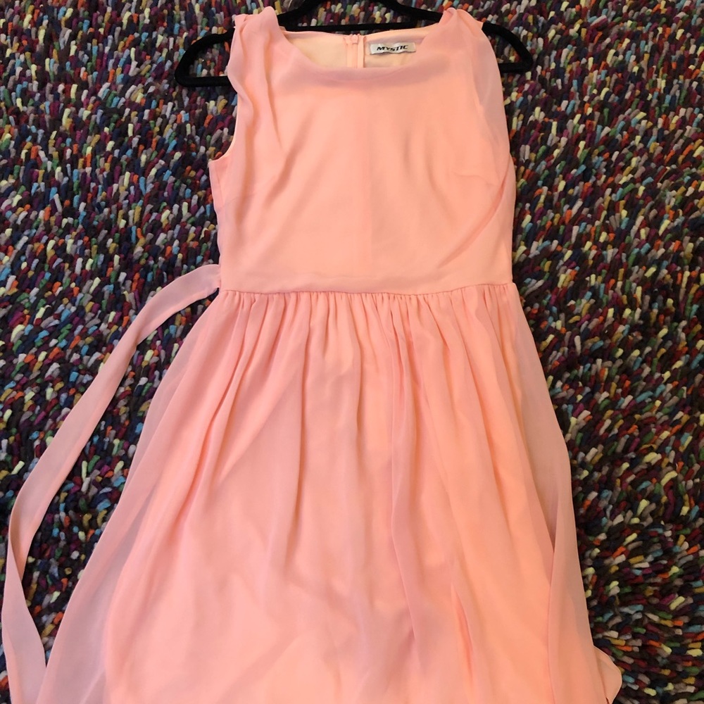 Pastel pink chiffon dress.
